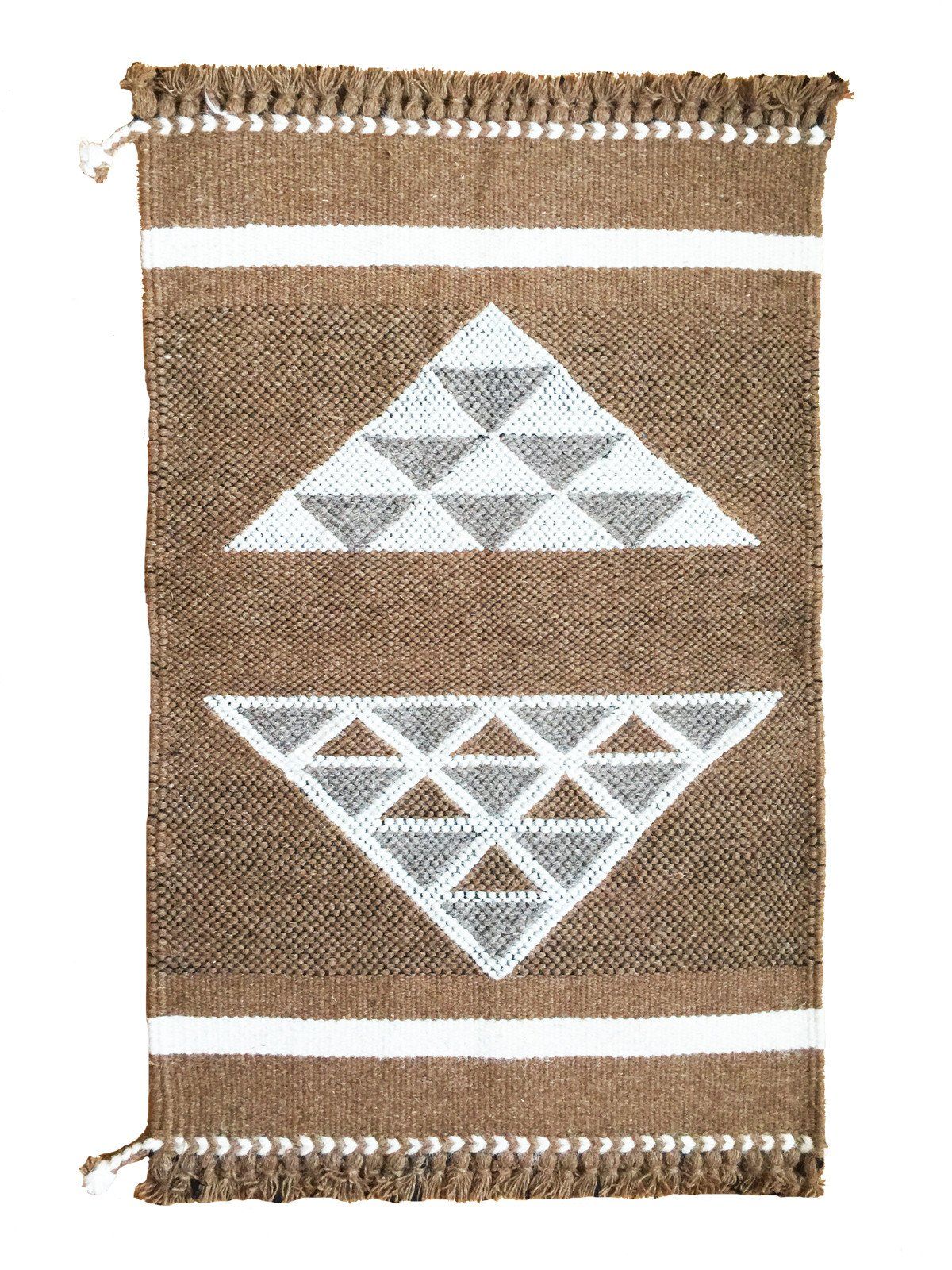Handwoven wall hangings and rugs! 100% undyed camel and sheep wool. Made by master weavers in Kutch, India.