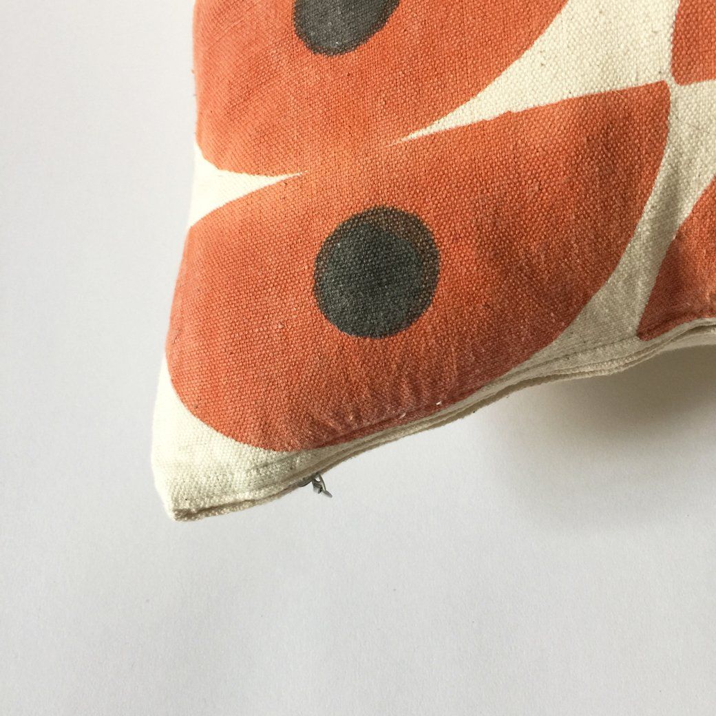 Our hand block printed pillows have a matching hidden zipper and come with an American made down insert. Ethically made in India.