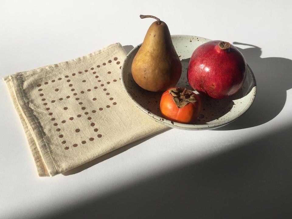Hand block printed cotton cloth napkins with a bold geometric polka dot design.