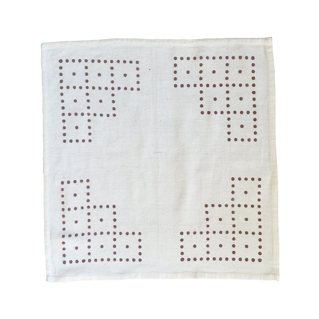 Natural block printed cotton cloth napkins with a cheery and minimal dot pattern.