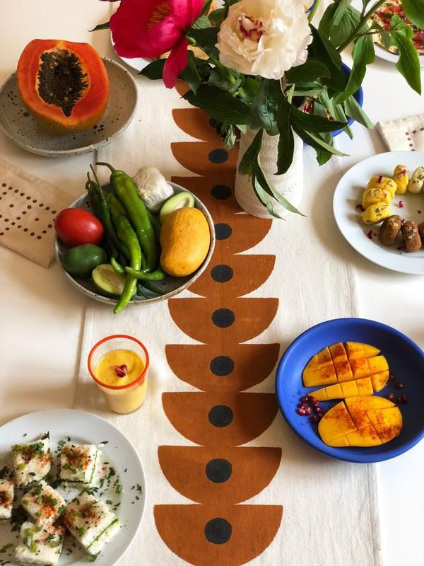 Handwoven, hand block printed table runner that doubles as an eye catching wall hanging too. Made by master block printers in Gujarat, India, your purchase will directly support the block printers and help preserve the ancient craft.