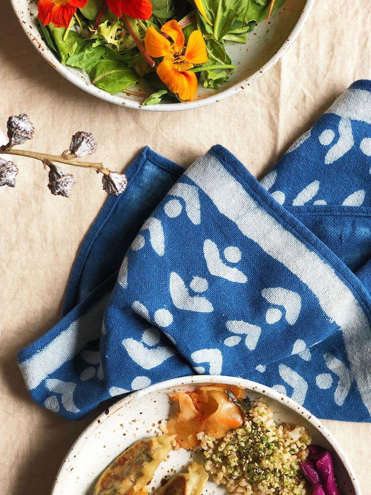 SUNDAY/MONDAY's napkins are hand block printed and hand dyed in a rich natural indigo blue. Printed on soft yet durable Indian khadi. Elegant blue and white cloth napkins.