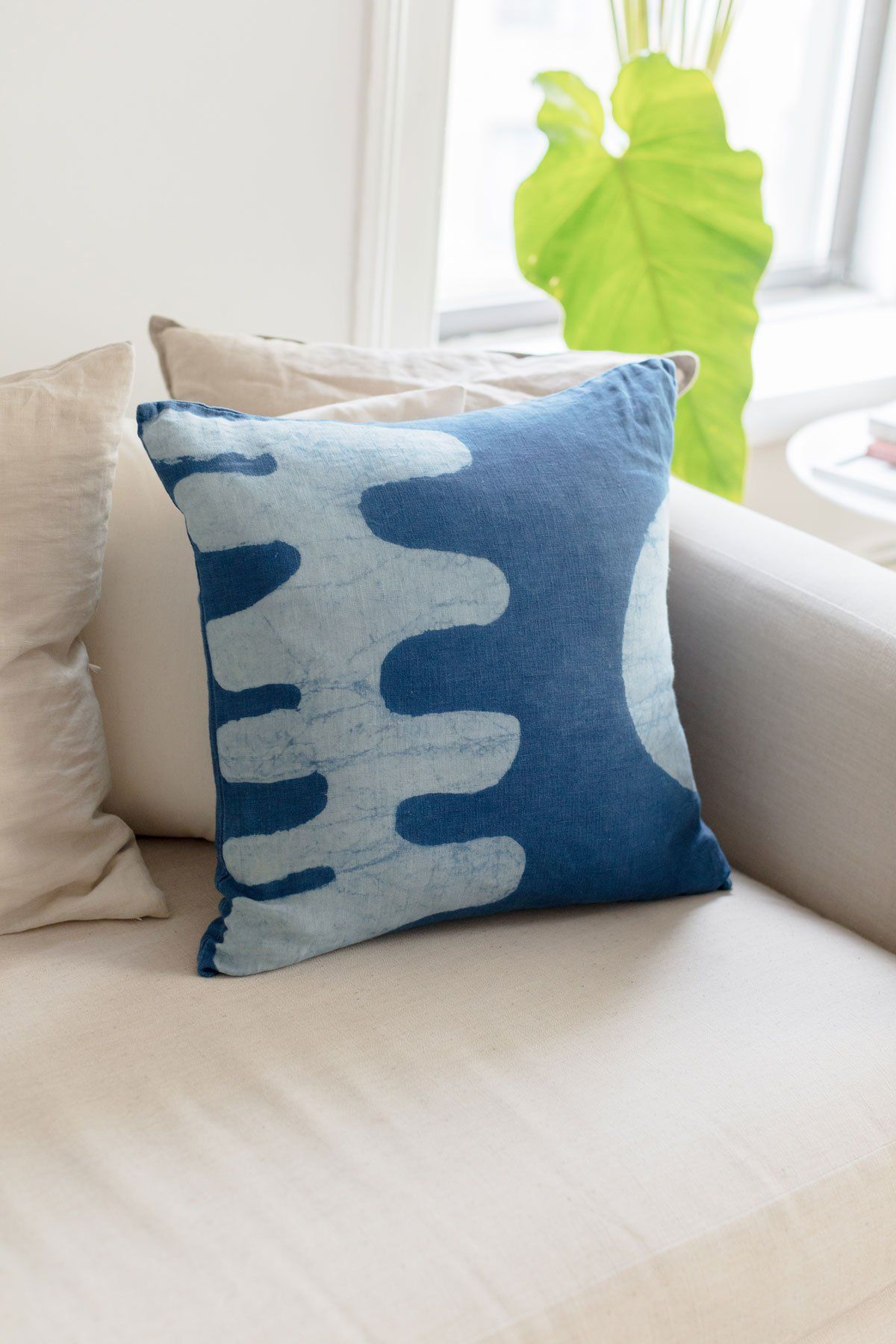 Blue Matisse inspired accent pillow by SUNDAY/MONDAY. Hand block printed and hand dyed with natural indigo. Featuring bold graphic cut out shapes.