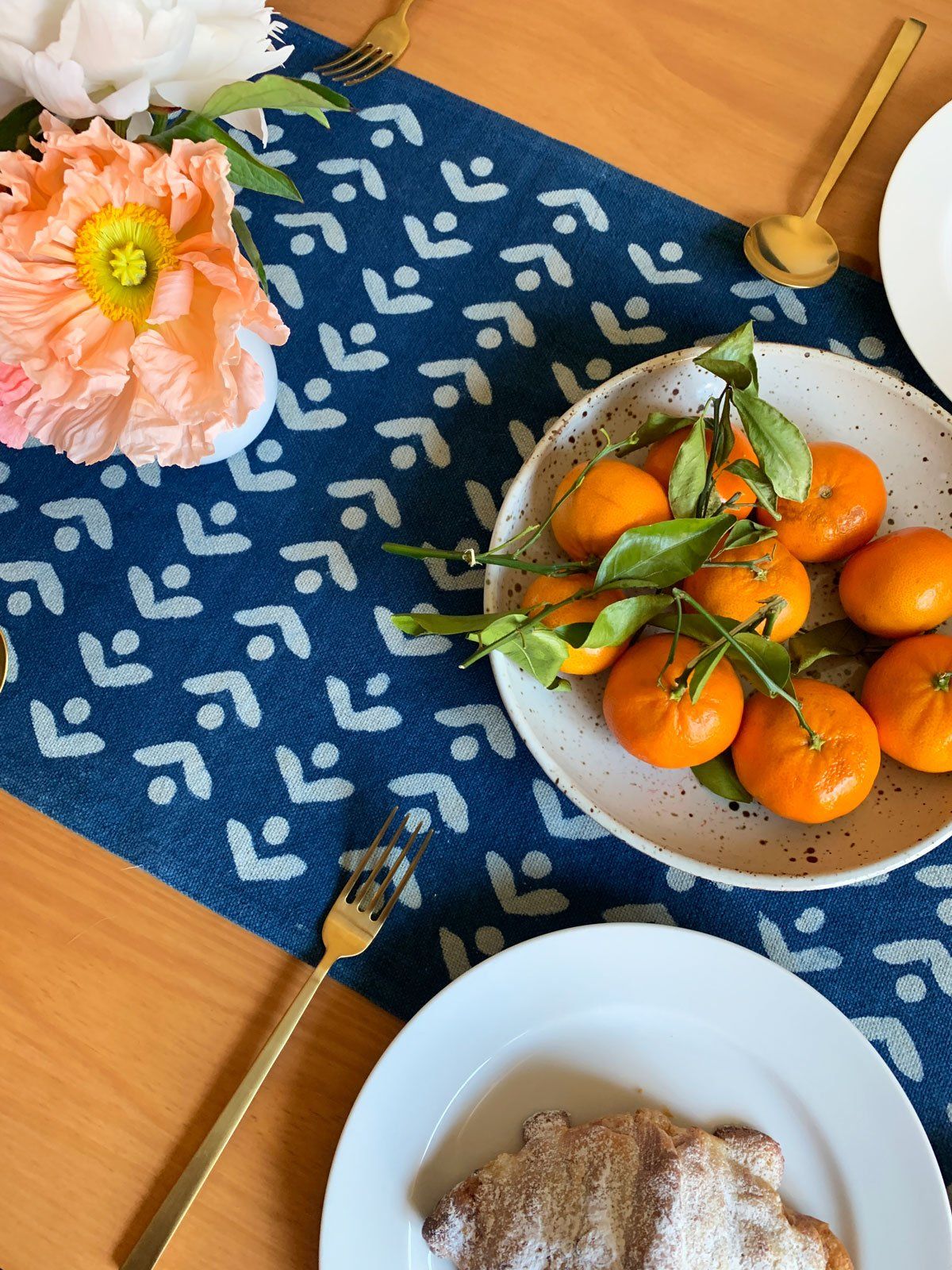 SUNDAY/MONDAY's blue and white Egret cotton table runner. Hand block printed and hand dyed with natural indigo in India. Floral inspired table runner.